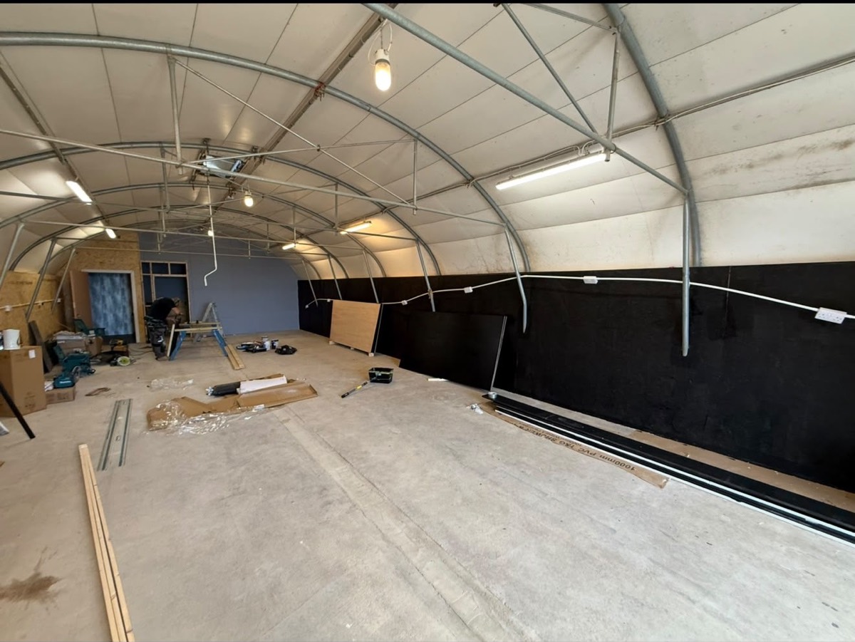 Interior fit out underway inside the arched training building